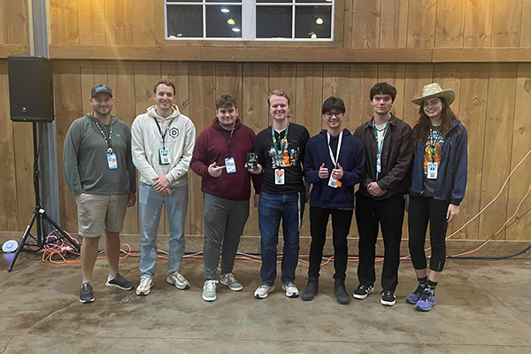 Wild West Hackin' Fest MetaCTF winners with their professor and their teammates from CPTC.